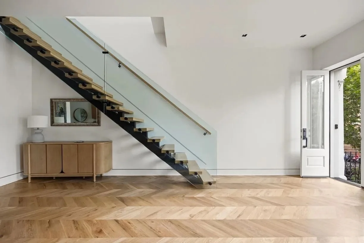 Architectural staircase within a whole-home renovation