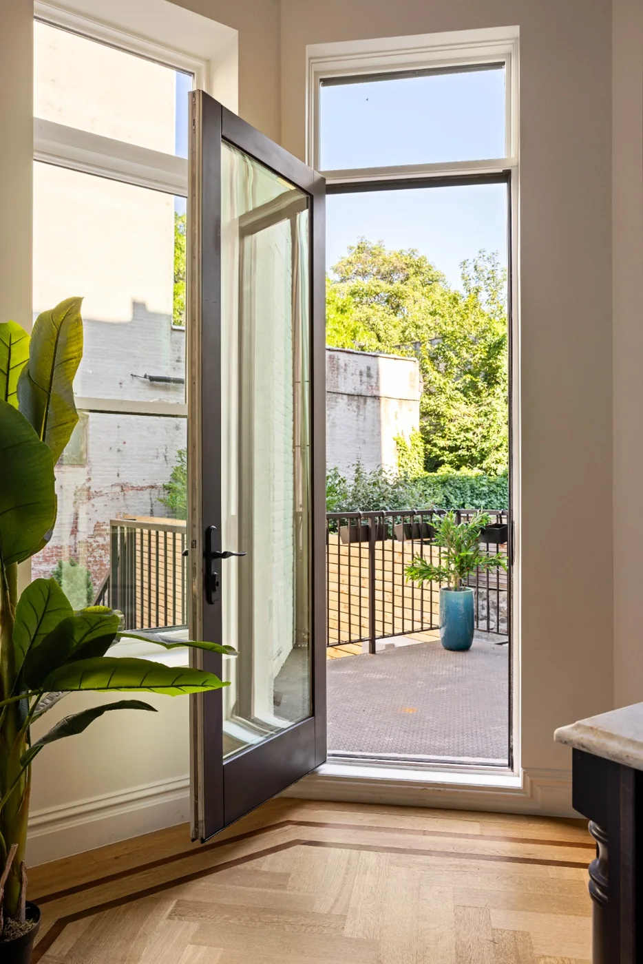 Door opening to a garden view