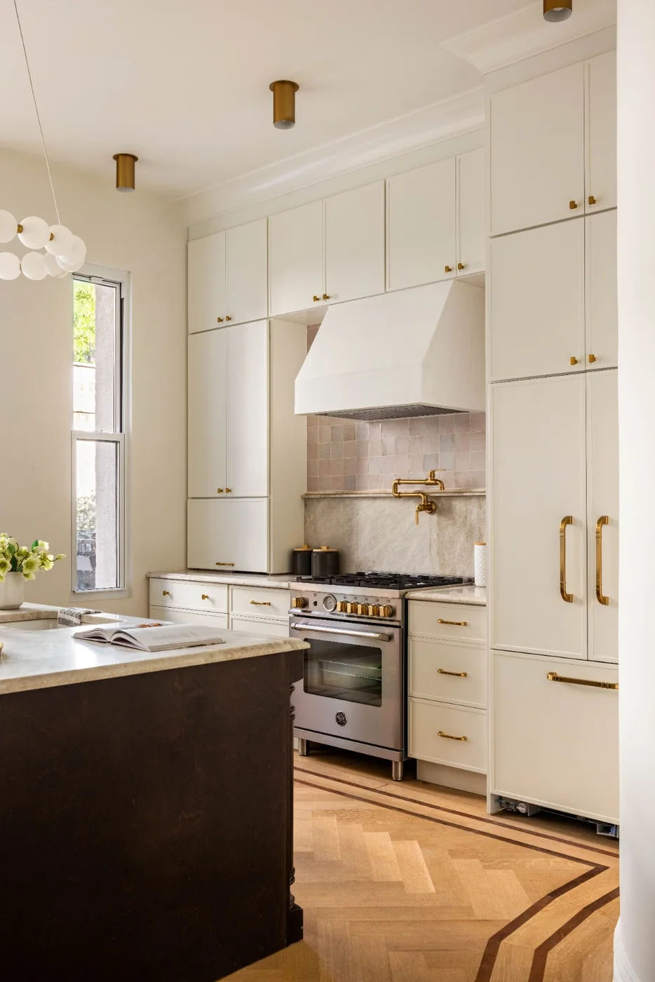 Refined kitchen range and brass fixtures