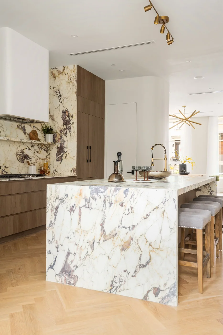 Marble waterfall kitchen island